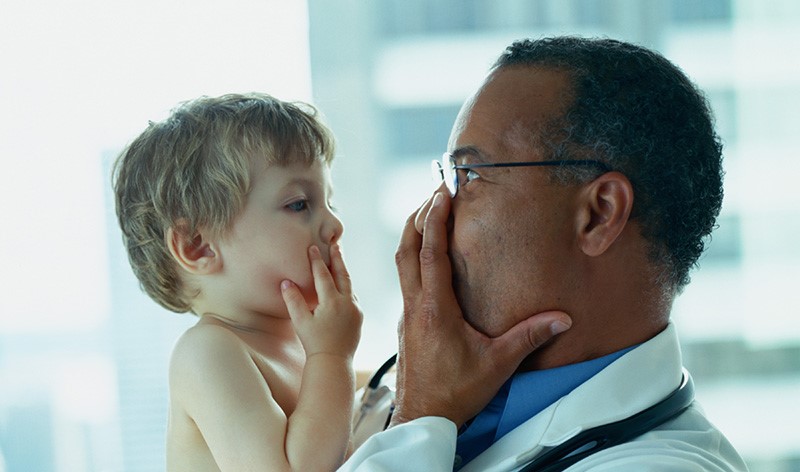 Pediatrician Playing with Toddler Patient
