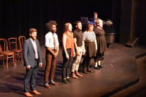 Second City performers on stage